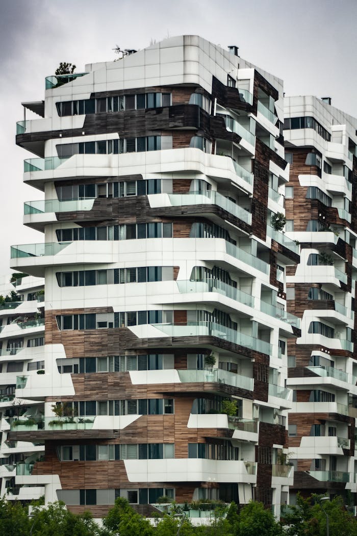 Stylish modern architecture of residential buildings with balconies in Milano, Italy.